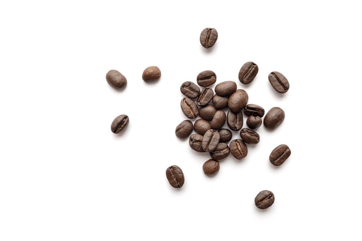 Coffee beans isolated on white background. Close-up.